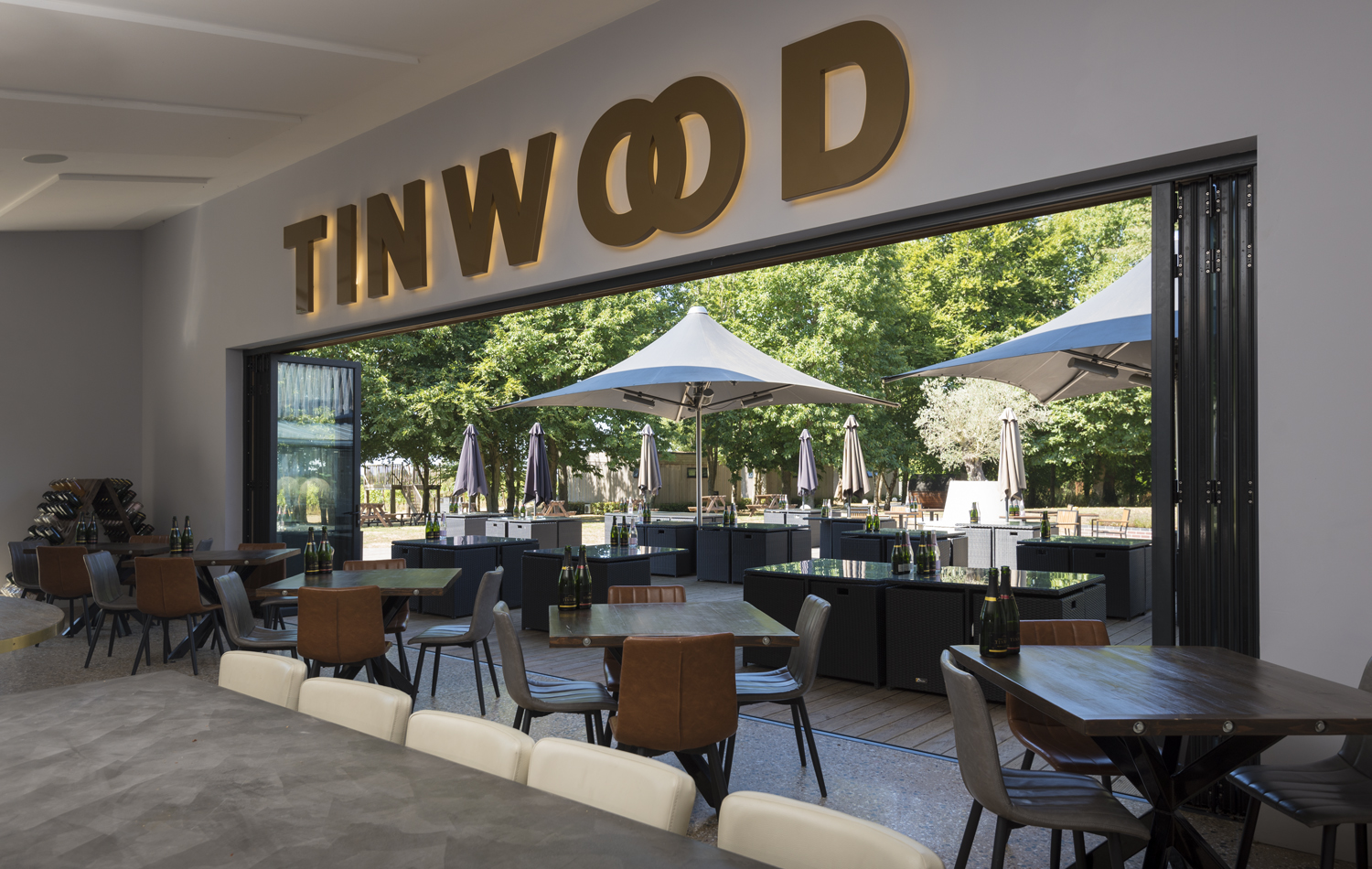 Beautifully vast bi-folding door sets welcome customers in to this magnificent Vineyard’s building.