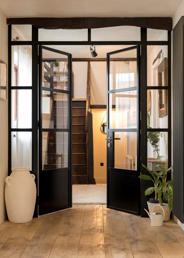 Black aluminium internal doors in a hallway